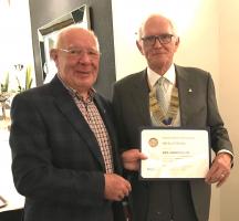 Michael Fletcher receives award from current president John Wilson